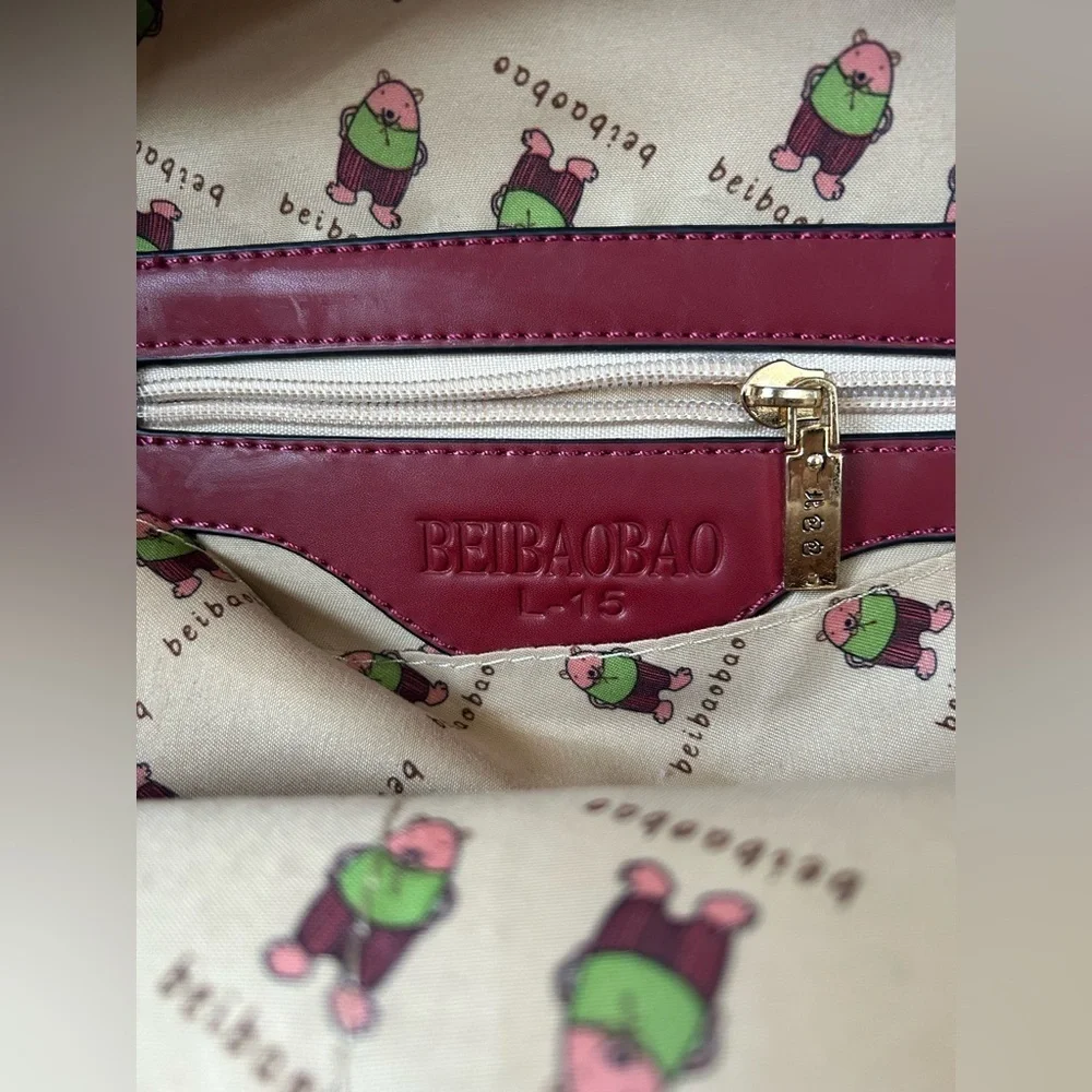 BEIBAOBAO BRICK RED BACKPACK. GORGEOUS COLOR. TOP HANDLE, ADJUSTABLE STRAPS.